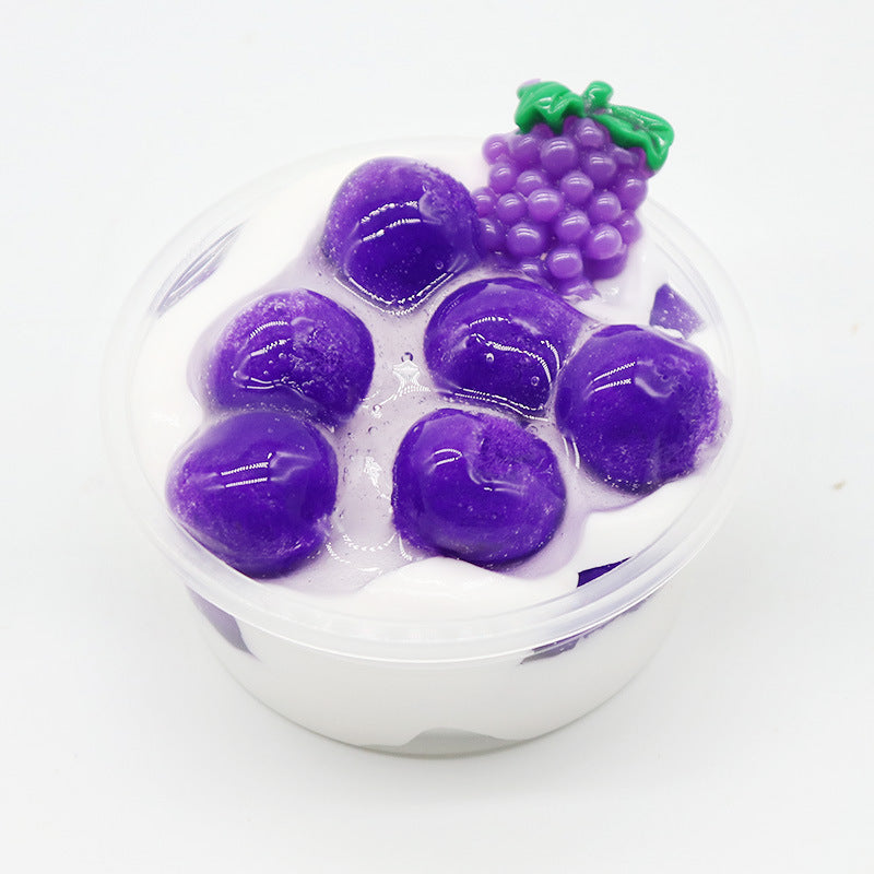Lollipop slime in clear cup with purple grape-like slime and green topper