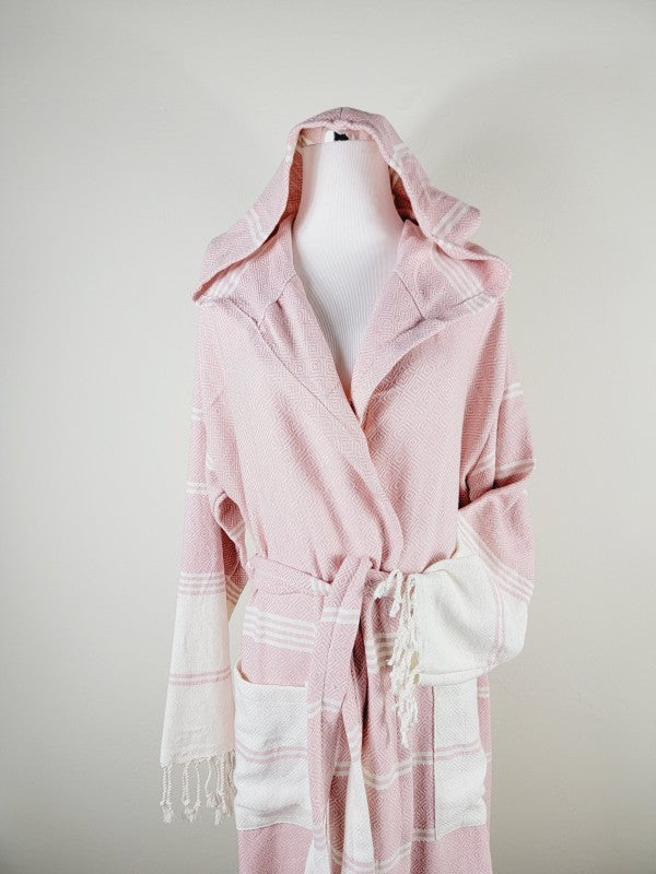 Pink unisex robe with hood, shawl collar, tie belt, and striped pocket detail