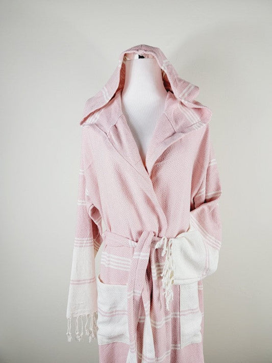 Pink unisex robe with hood, shawl collar, tie belt, and striped pocket detail