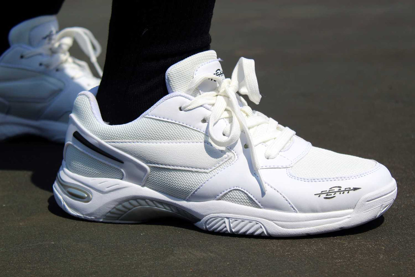 Men's white walking shoes with lace-up design and cushioned sole