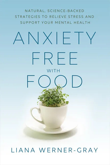 Paperback book cover with light blue title 'Anxiety Free with Food' and potted herb cup