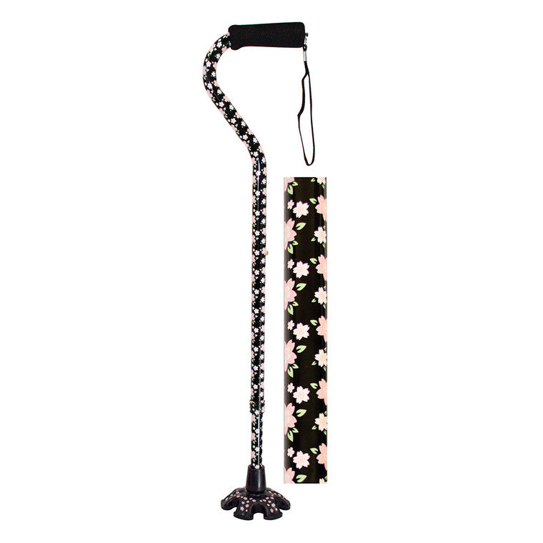 Offset walking cane with black handle, pink floral grip, and wide standing tip
