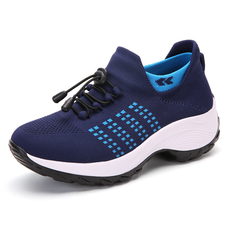 Women’s athletic knit sneaker in navy with light-blue dotted pattern and white sole