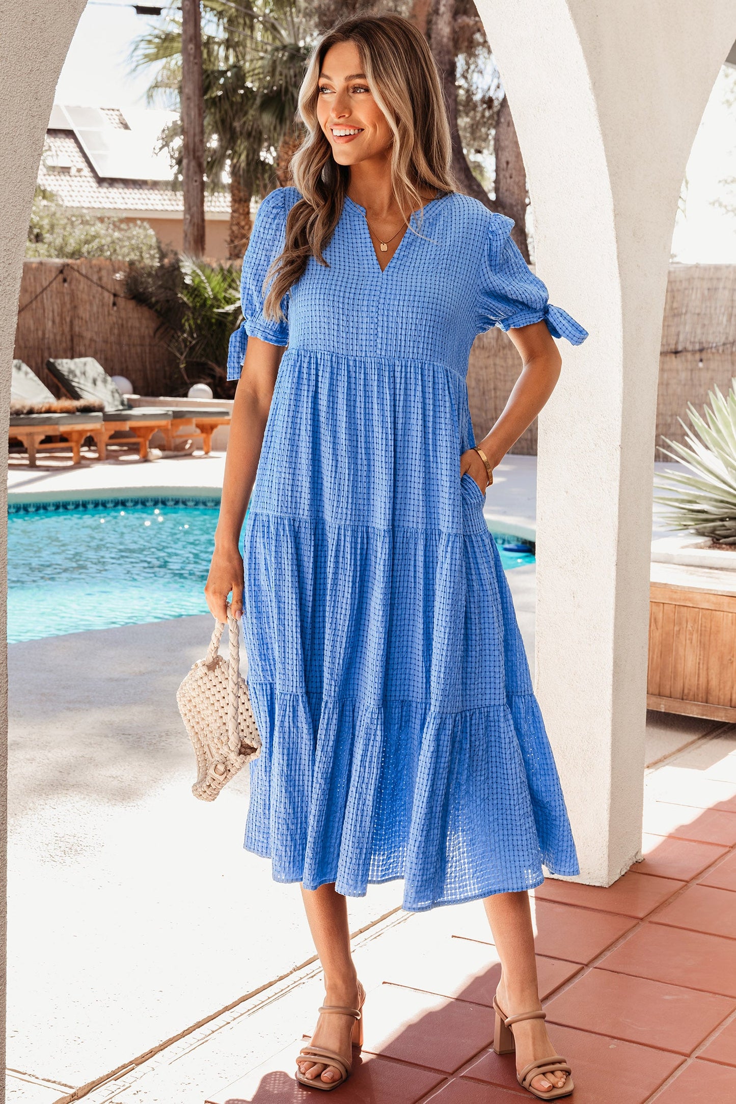 Dusk blue tiered midi dress with buttonless V-neck and tiered ruffles