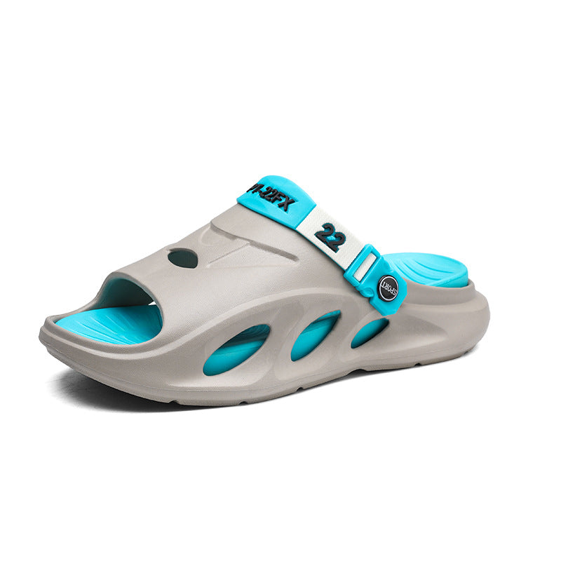 Gray slide sandals with blue strap and turquoise footbed, open toe design