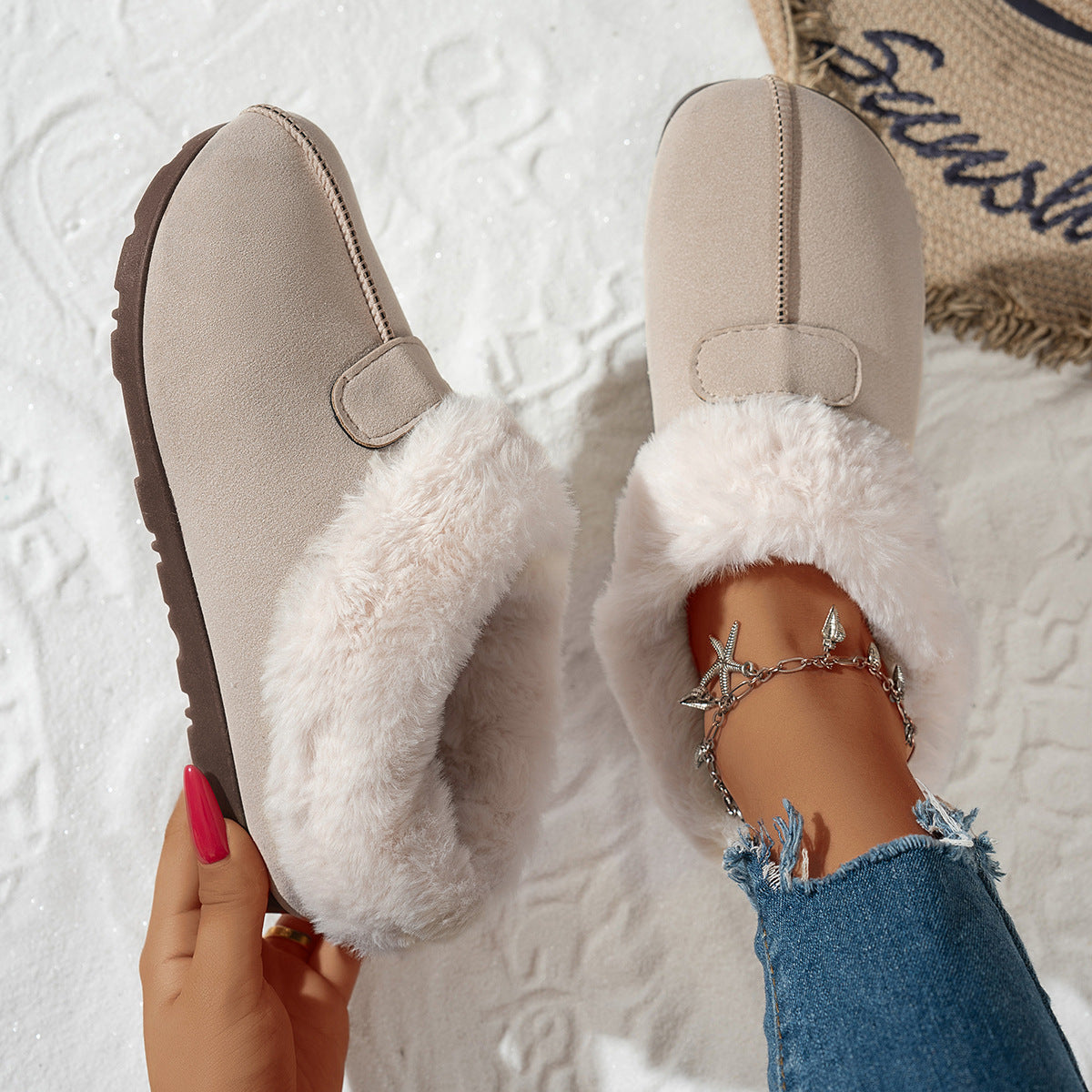 Women's snow boots in light beige with white faux-fur lining and side strap