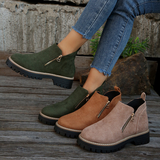 Green and brown suede ankle boots with side zipper and chunky lug sole