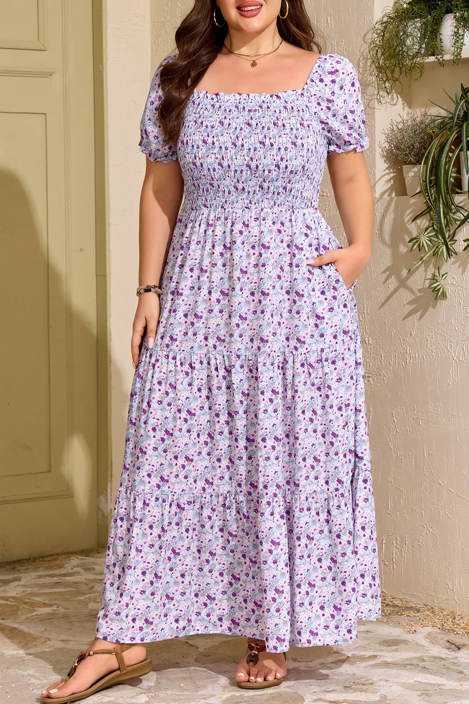 Purple floral smocked maxi dress with square neckline and puff sleeves, tiered maxi skirt
