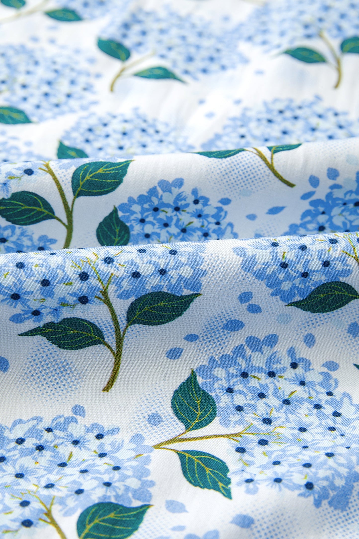 Sky blue floral long dress fabric with green leaves and blue flowers