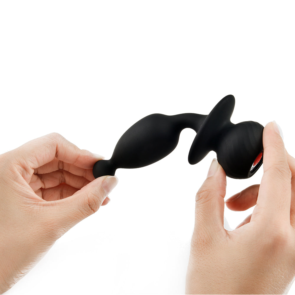Black silicone bunny-shaped anal plug with rounded base and rear tip