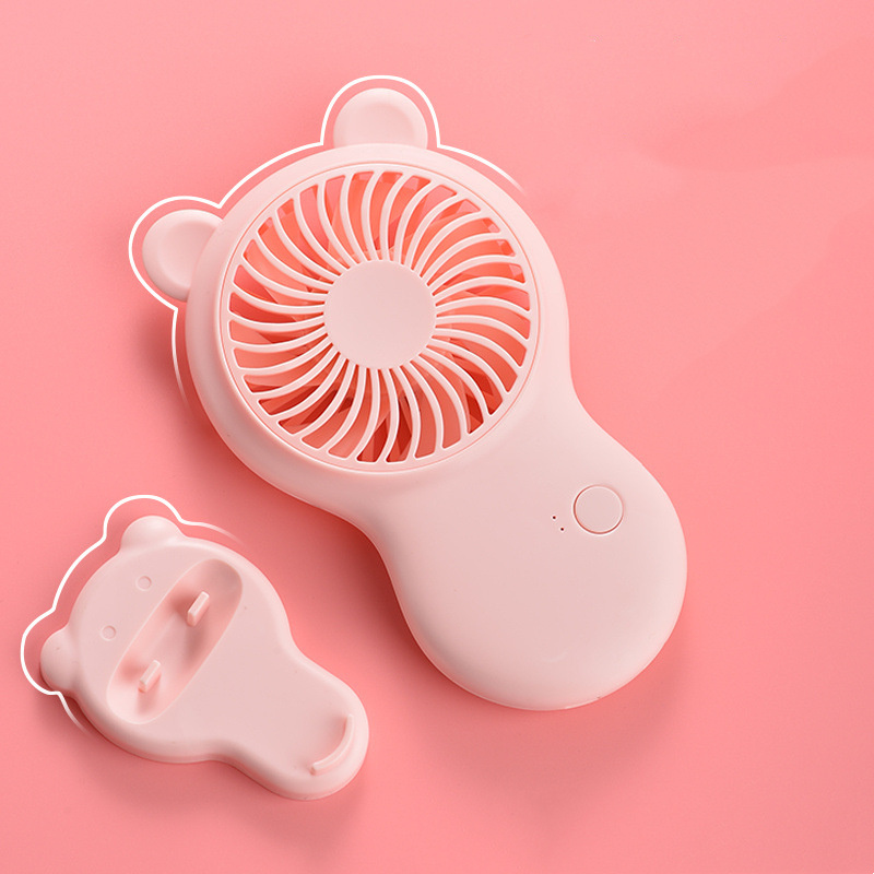 White bear-shaped pocket mini fan with round glowing grille and compact stand