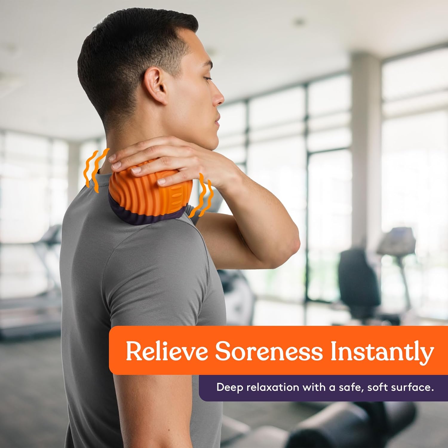 Orange and purple vibration massage ball pressed against a person’s neck