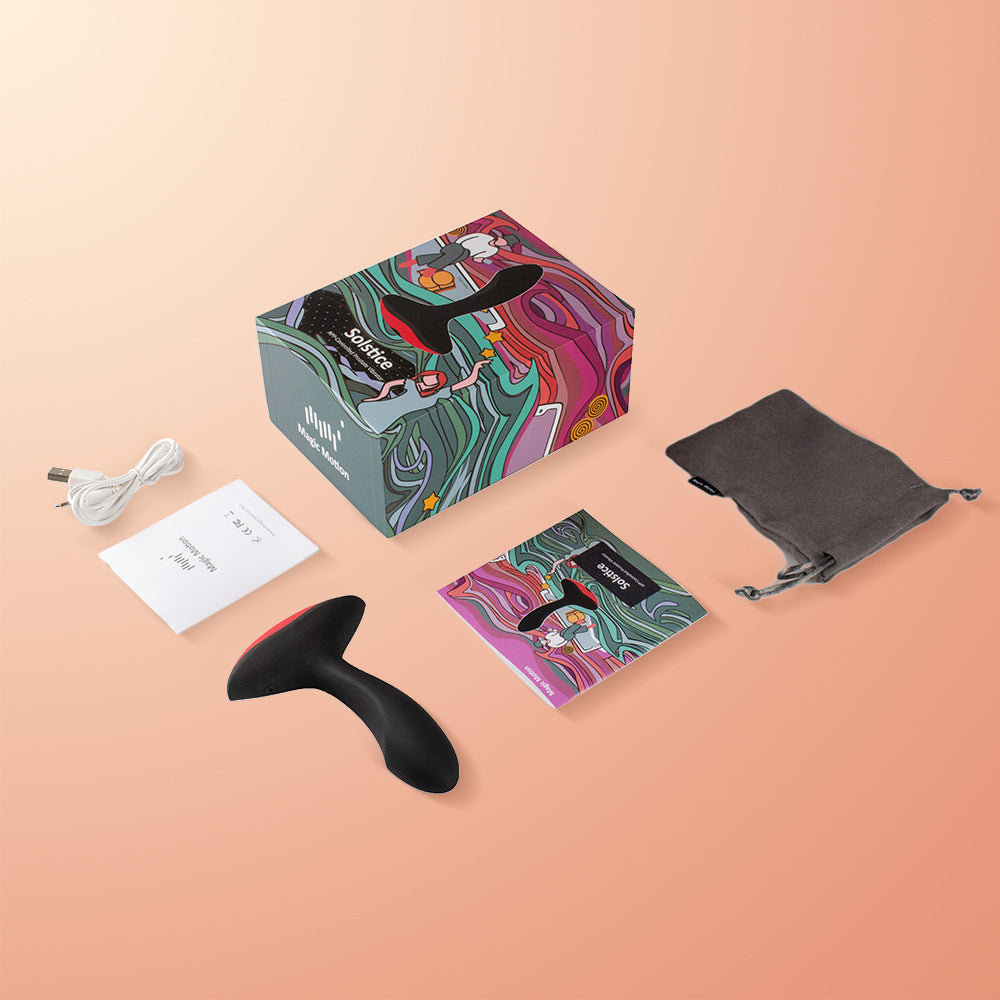 Anal massager starter kit with black silicone toy, box, pouch, and accessories