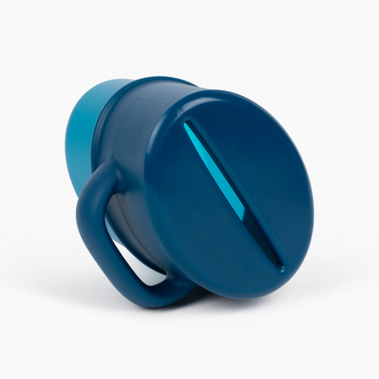 Blue flipping snack cup with attached lid and carry handle