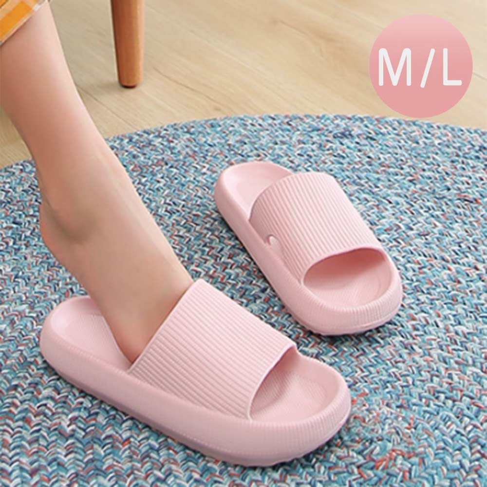 Pink slide sandals with wide ribbed strap and cushioned open-toe sole