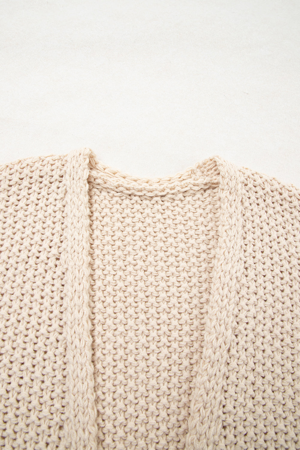 Parchment crochet open-front cardigan with textured knit and long sleeves
