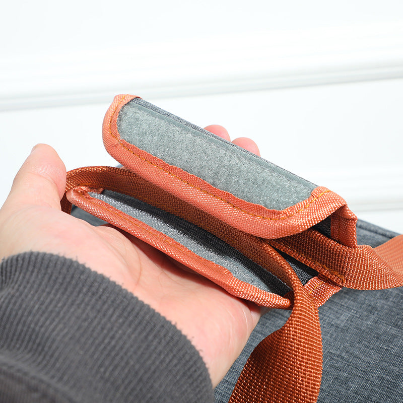 Gray insulated lunch bag cooler crossbody with orange webbing strap detail