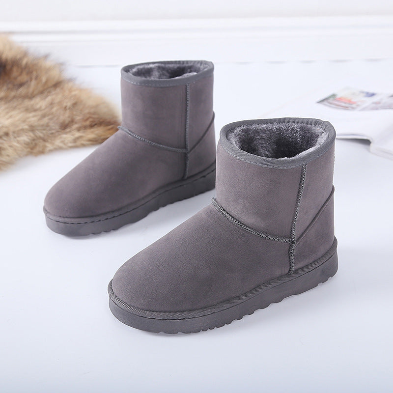 Women’s winter snow boots in grey suede with faux fur lining and slip-on cuff