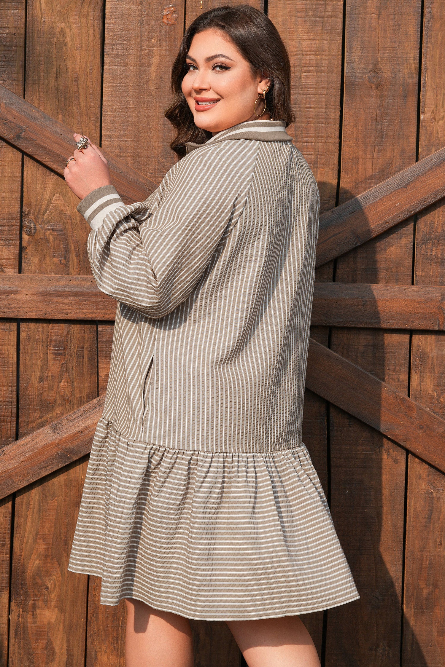 Khaki stripe mini dress, long puff sleeves, back view with tiered ruffle hem