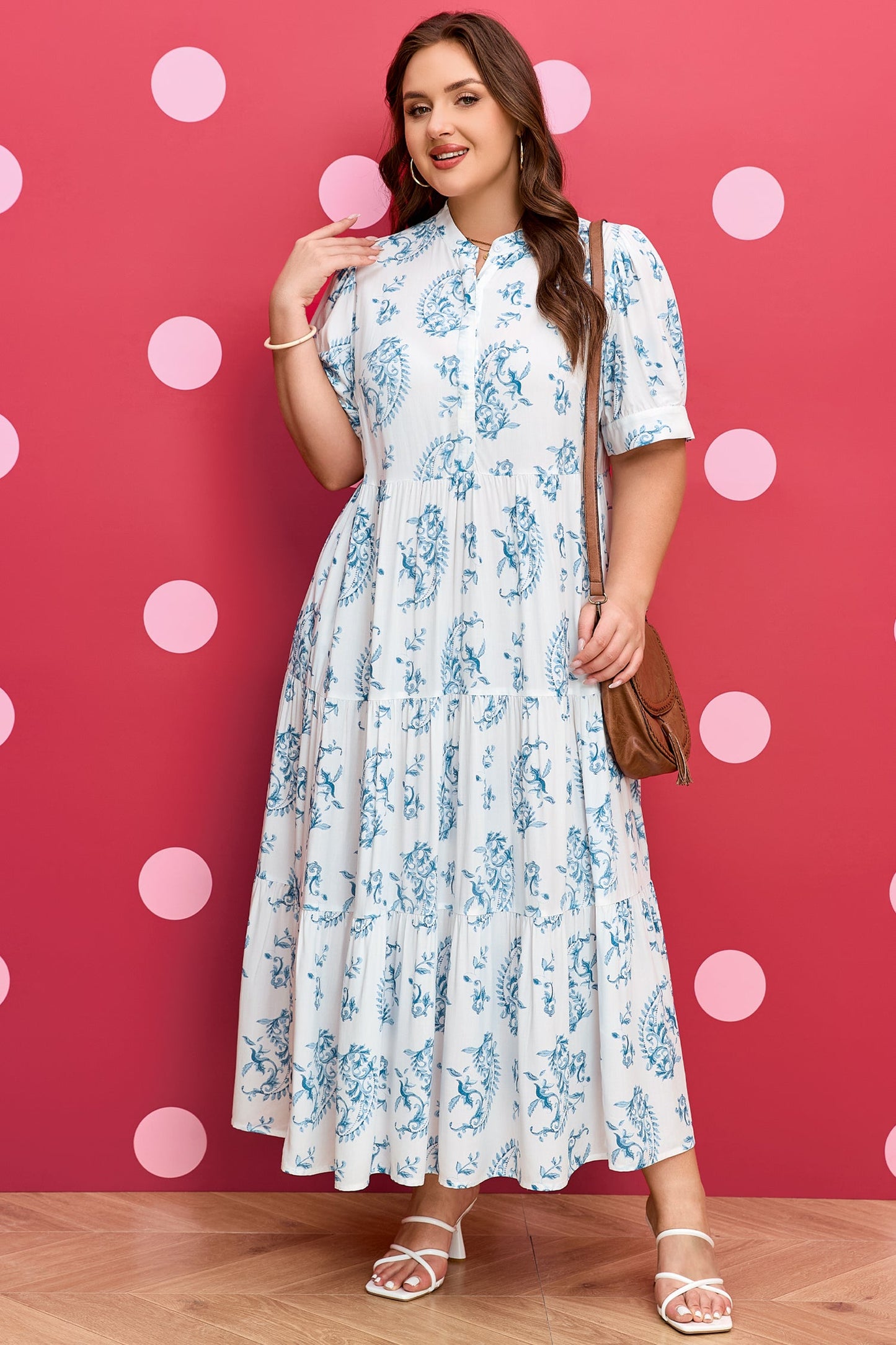 Sky-blue floral tiered maxi dress with short sleeves and cinched waistline