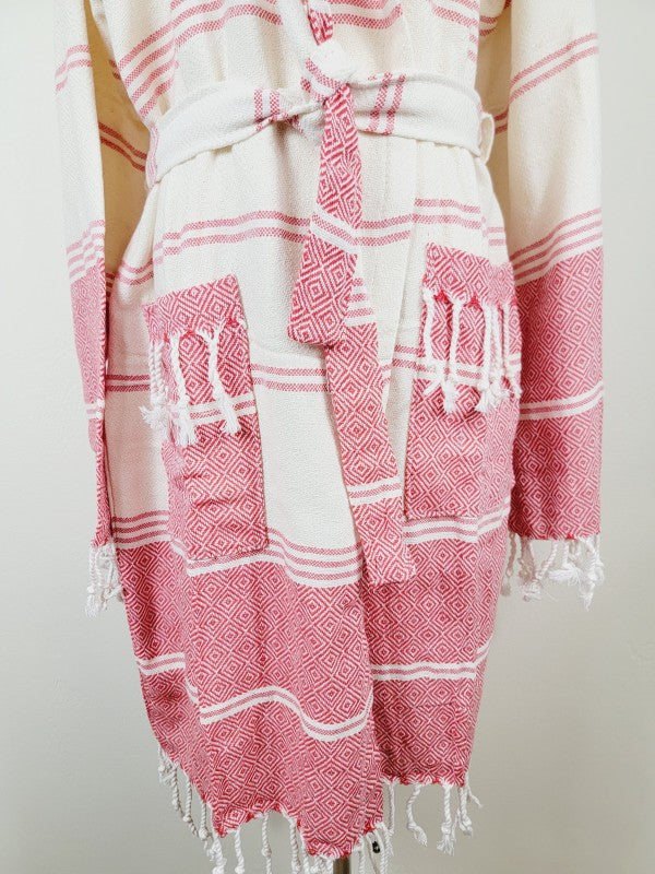 Unisex robe waist and pocket view: red-and-white geometric stripes, tie belt, tassels