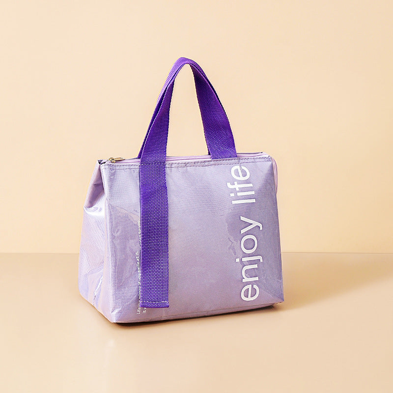 Insulated lunch bag in light purple with purple handles and zip closure, printed lettering