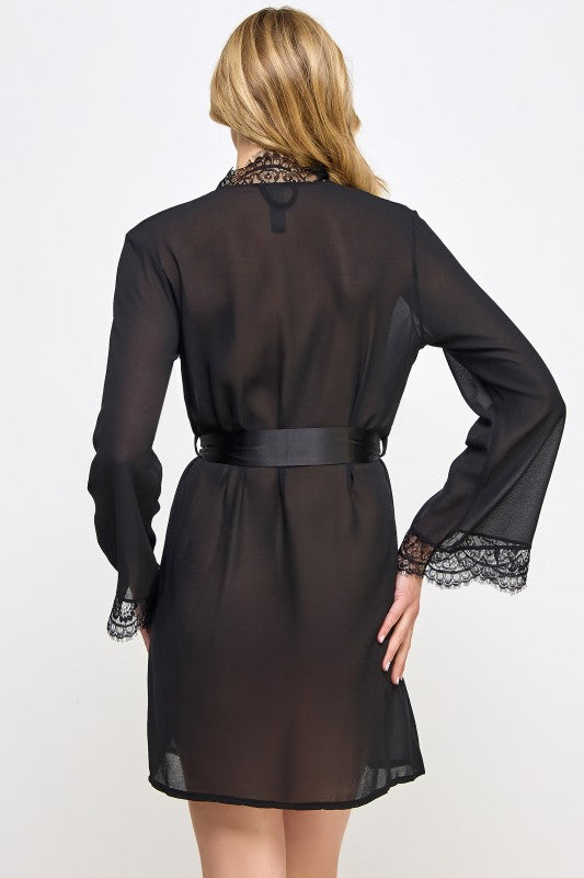 Black sheer robe back view with tied waist and lace-trim cuffs, short length
