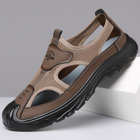 Men's tan mesh cutout sandals with adjustable strap and black cushioned sole