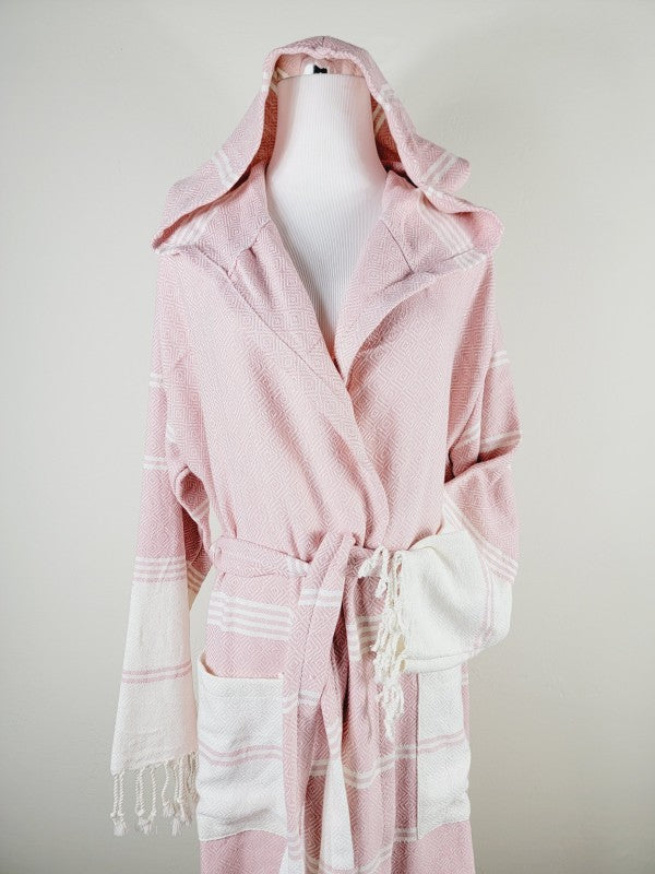 Pink hooded robe with shawl collar and tie belt; side pocket opening visible