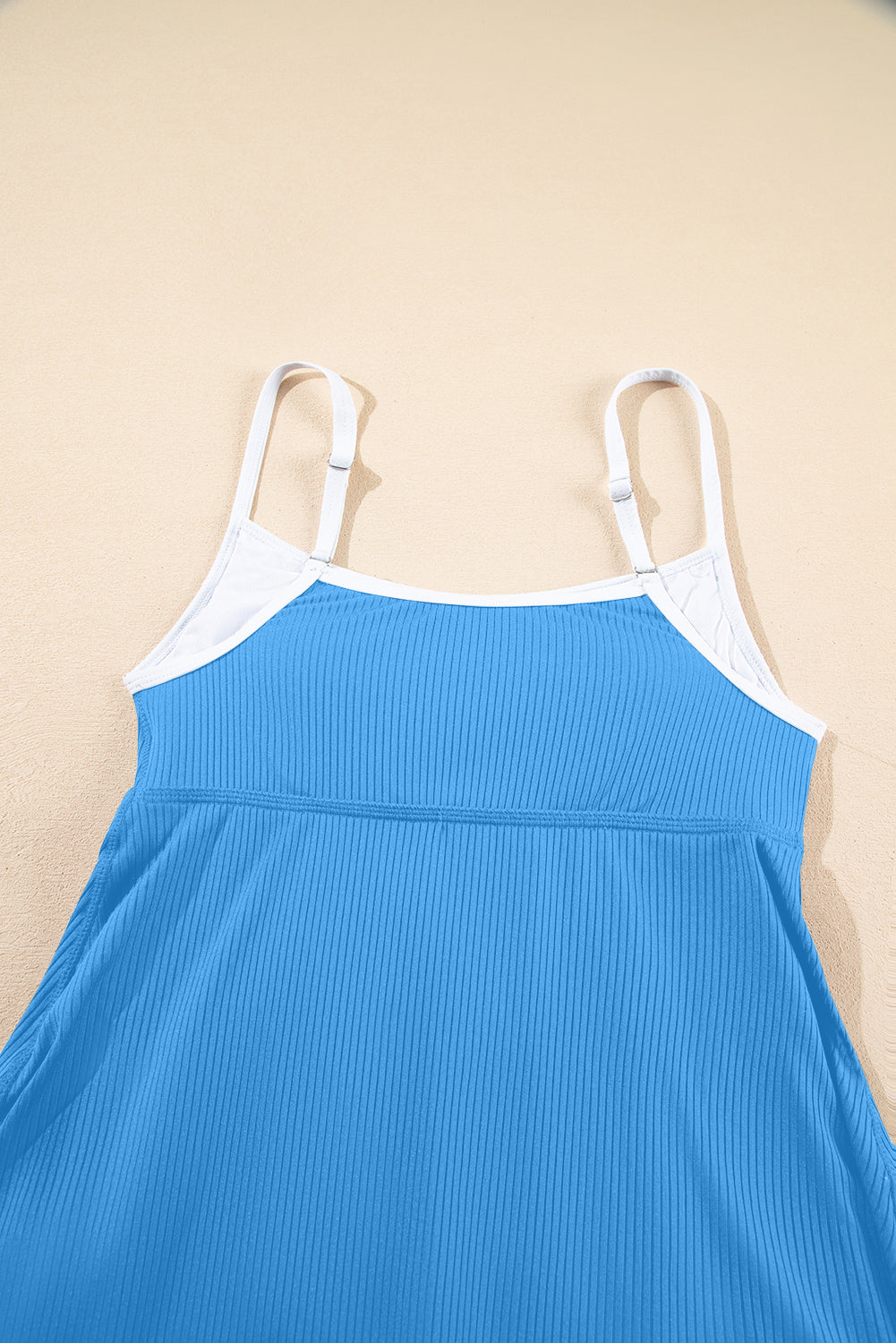 Dusk blue ribbed lined swim dress front view with white shoulder straps