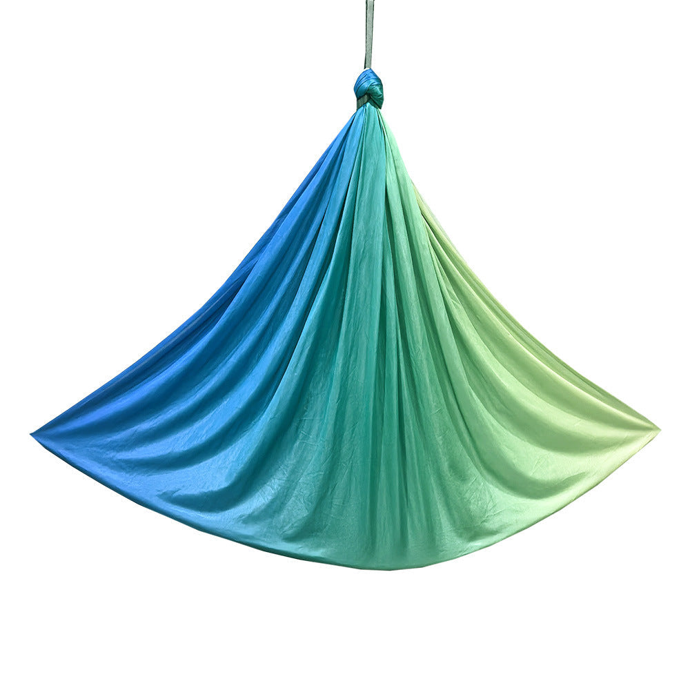 Sensory hammock swing chair in blue-to-green gradient fabric with hanging rope