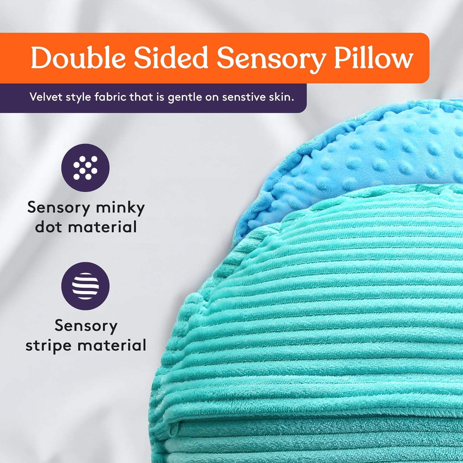 Double-sided sensory pillow in teal: dot minky texture and ribbed stripe fabric sections.
