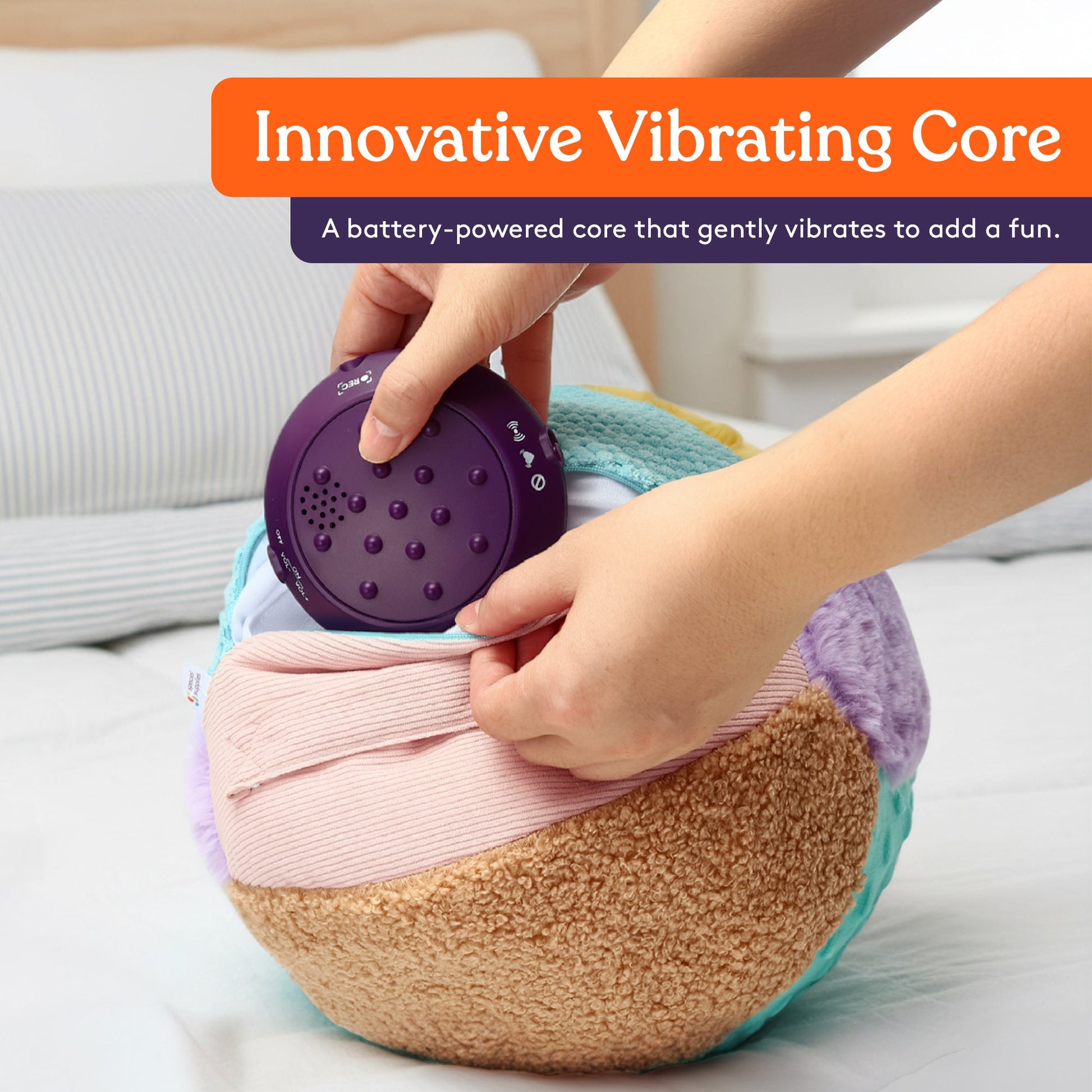 Sensory vibrating weighted pillow with removable purple control unit being pressed