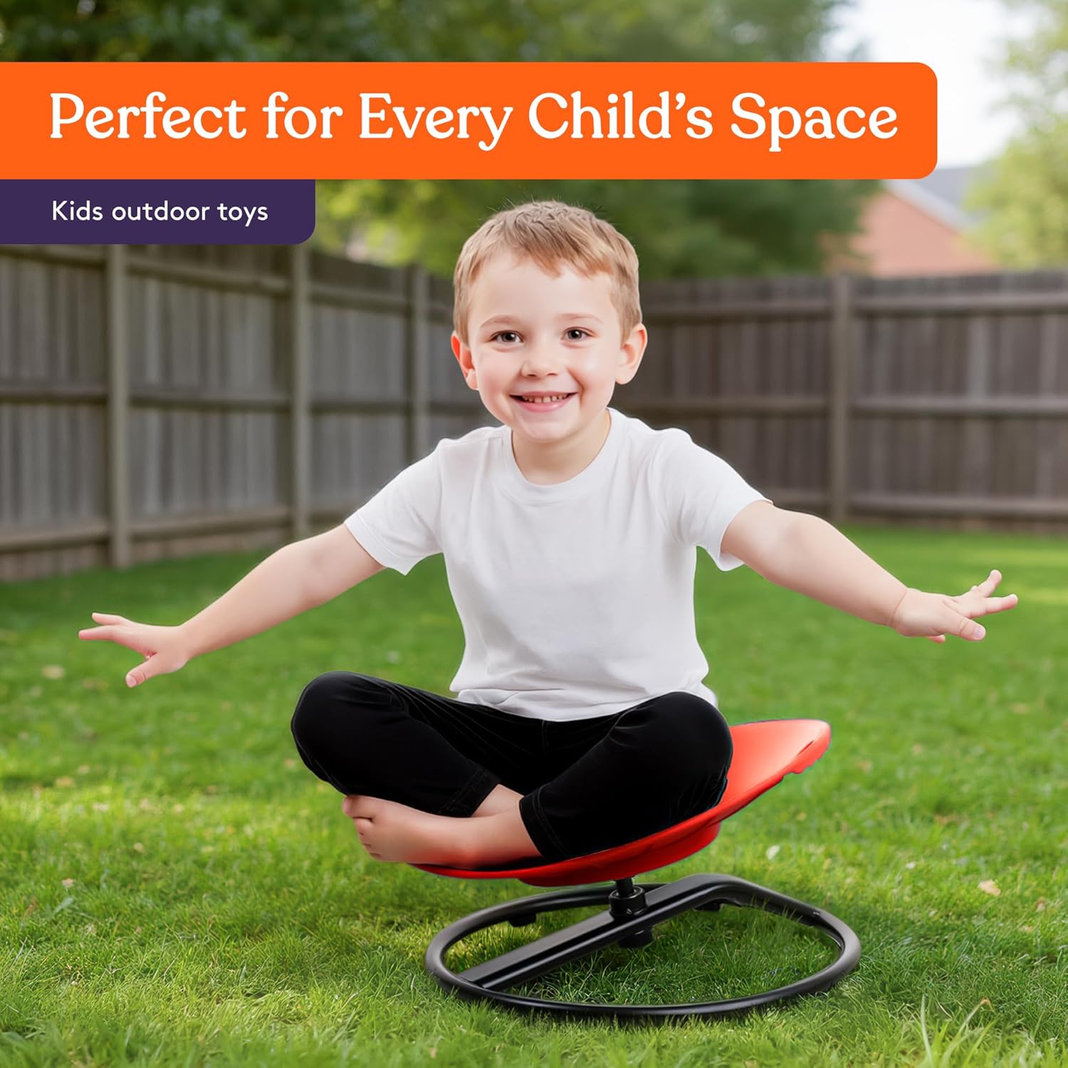 Red kids spinning chair with smile face and black base, shown outdoors
