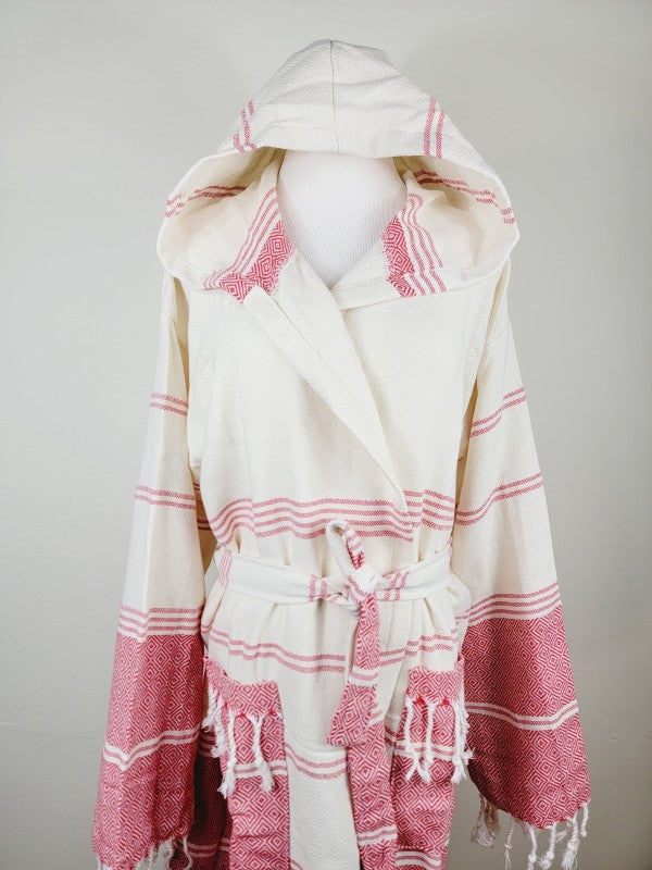 Unisex hooded bathrobe back view in cream with pink stripe and diamond print, tied waist belt.