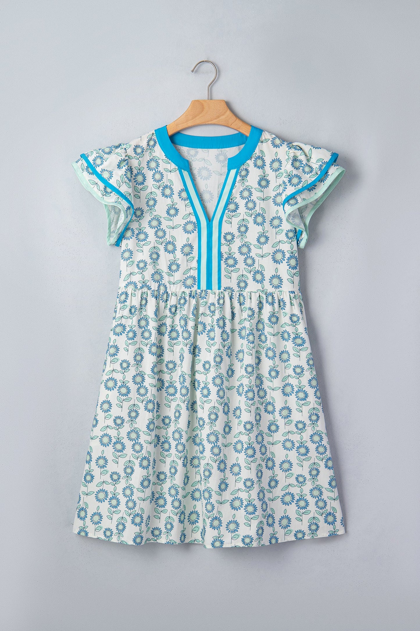 Sky blue flutter-sleeve mini dress on hanger with blue-trim V placket and floral print