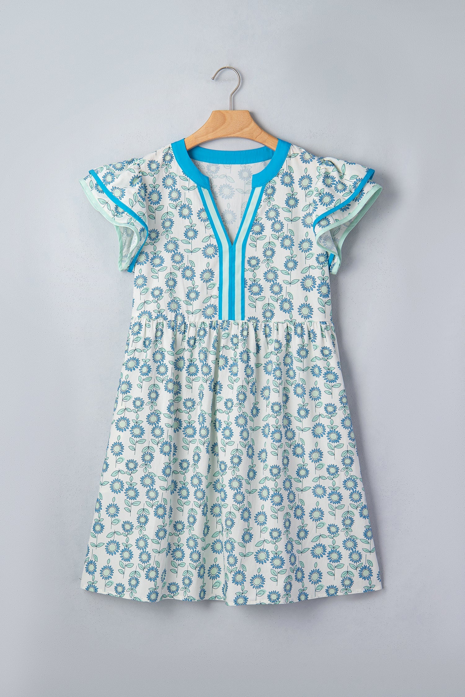 Sky blue flutter-sleeve mini dress on hanger with blue-trim V placket and floral print