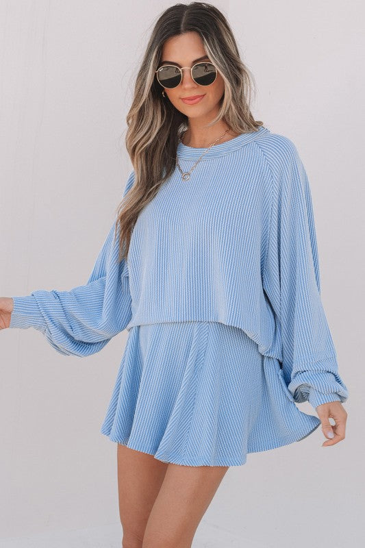 Light blue corded top and ruffle mini skirt set, long sleeves, flared skirt, front view