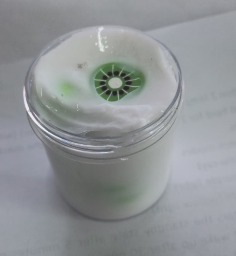 Lollipop slime in clear cup with green patterned disk