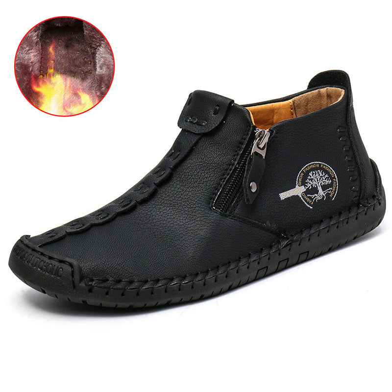 Men's ankle boots in black leather with side zipper and rugged tread sole