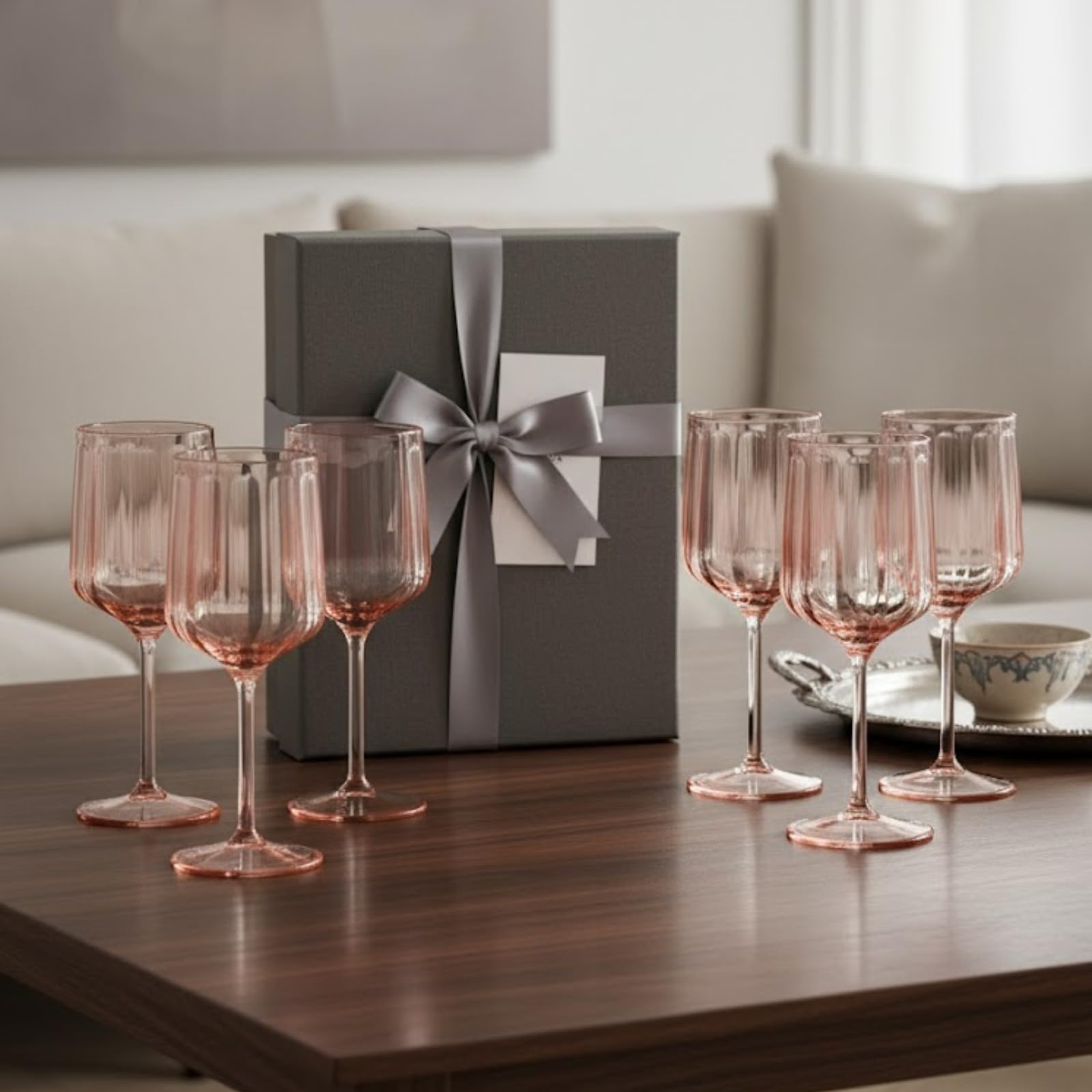 Set of 6 pink acrylic stemmed goblets with clear ribbed cups and round bases