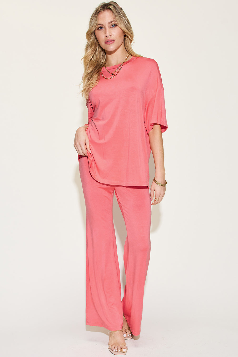 Coral drop-shoulder t-shirt and flare pants set with short sleeves and wide-leg pants