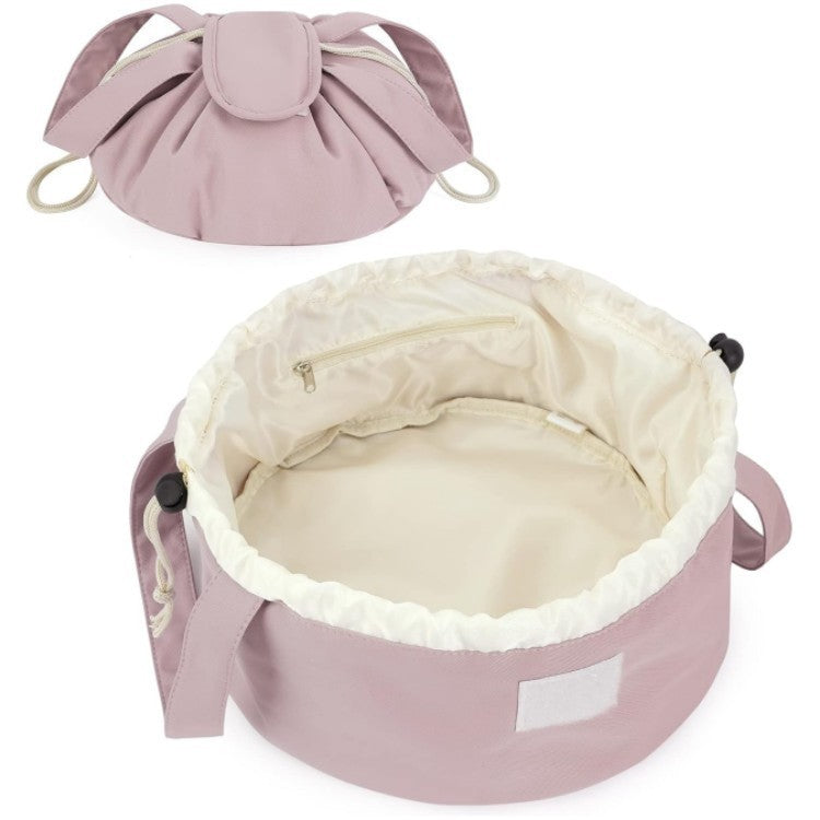 Blush pink drawstring makeup bag interior, ruffled lining and inner zippered pocket
