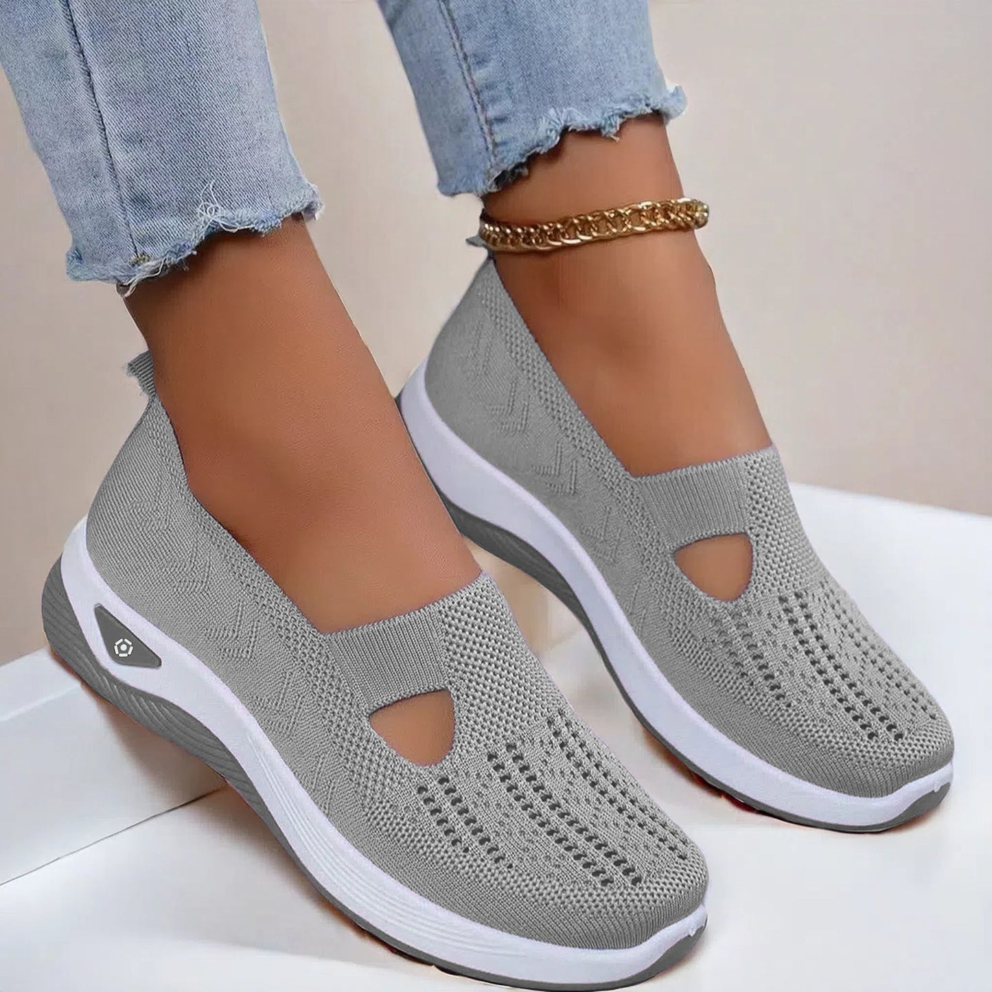 Gray knit mesh flats with oval cutout and white sole, slip-on casual shoes