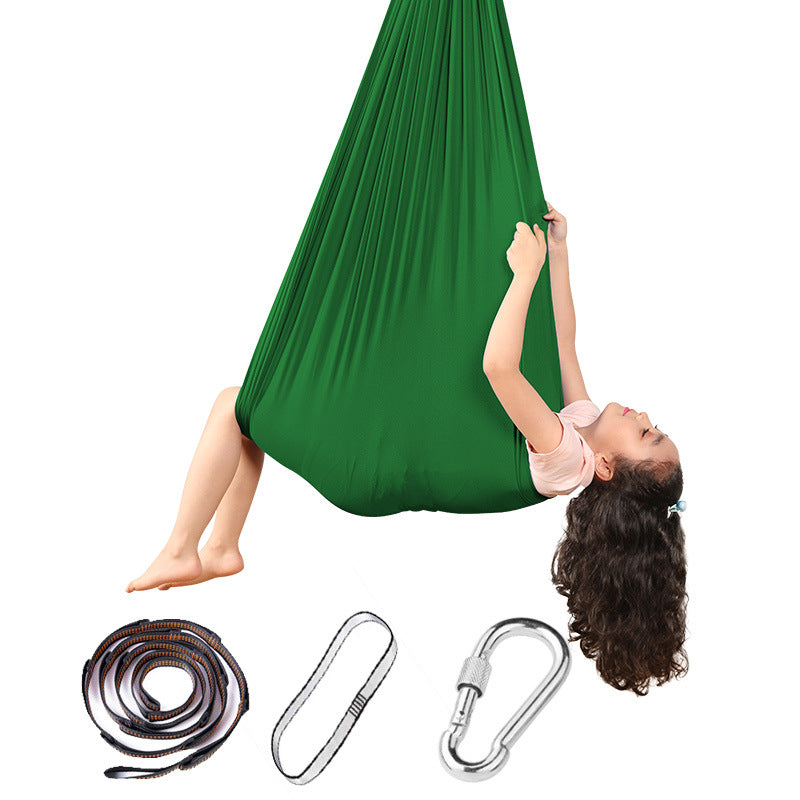 Hanging hammock swing chair in grass green with included rope, straps, and carabiners.