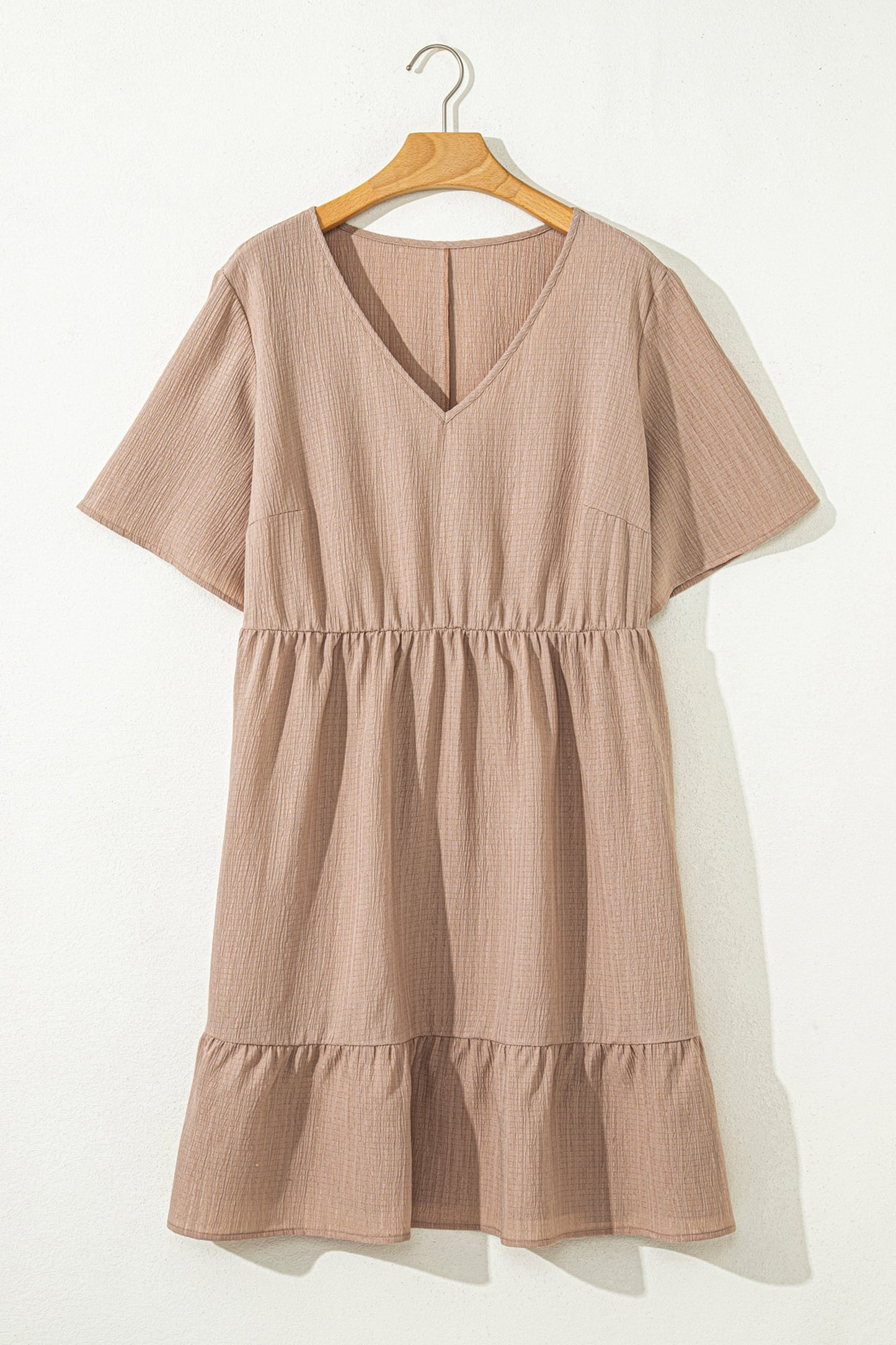Dark khaki PLUS short-sleeve V-neck tiered dress on hanger
