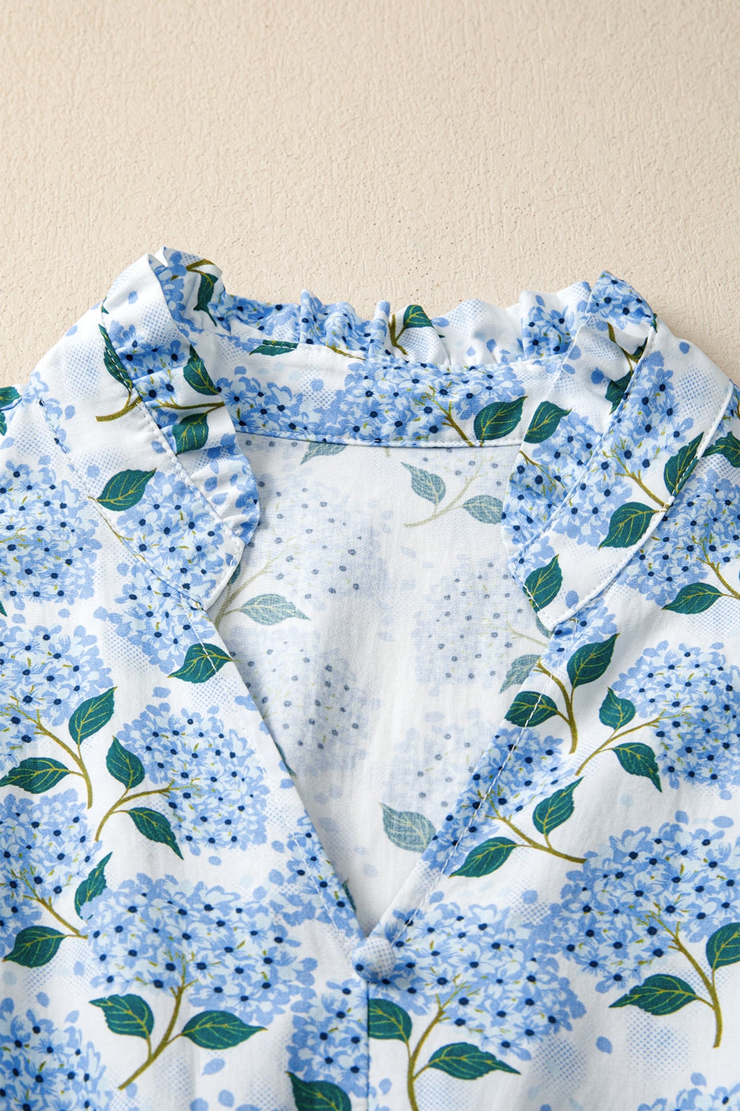 Sky blue V-neck long dress with gathered flutter shoulders and floral print