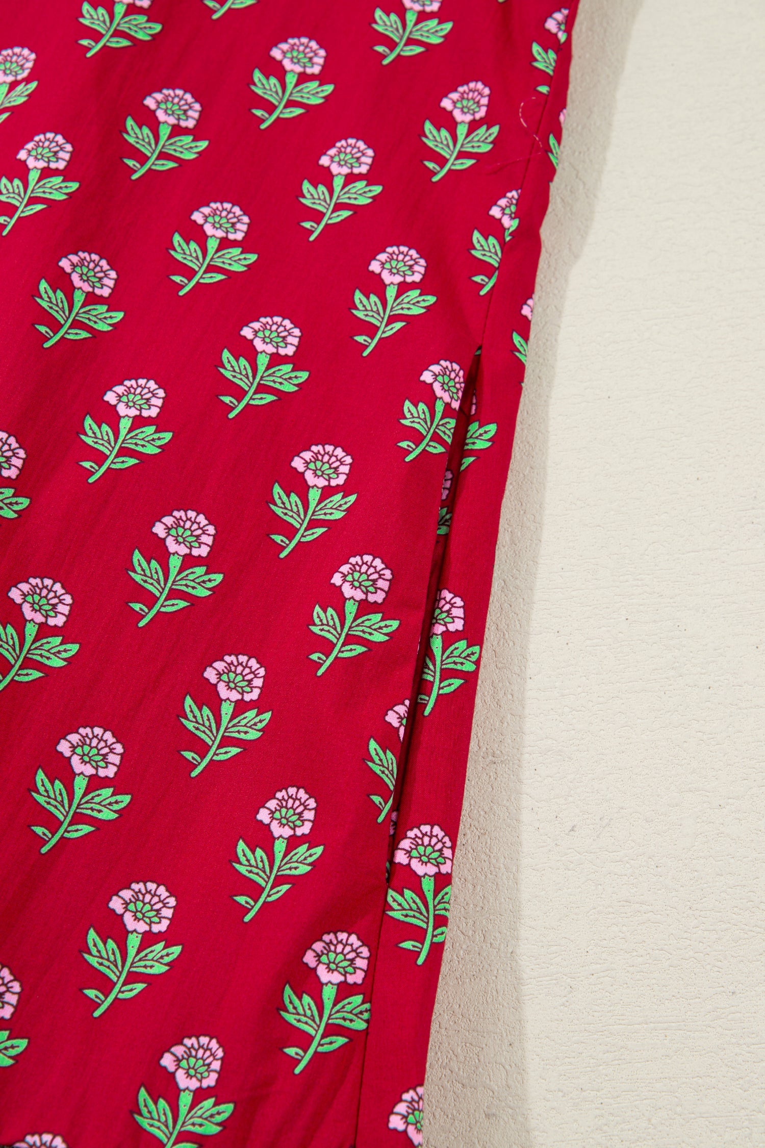 Red mini dress fabric panel with green vine and pink flower print