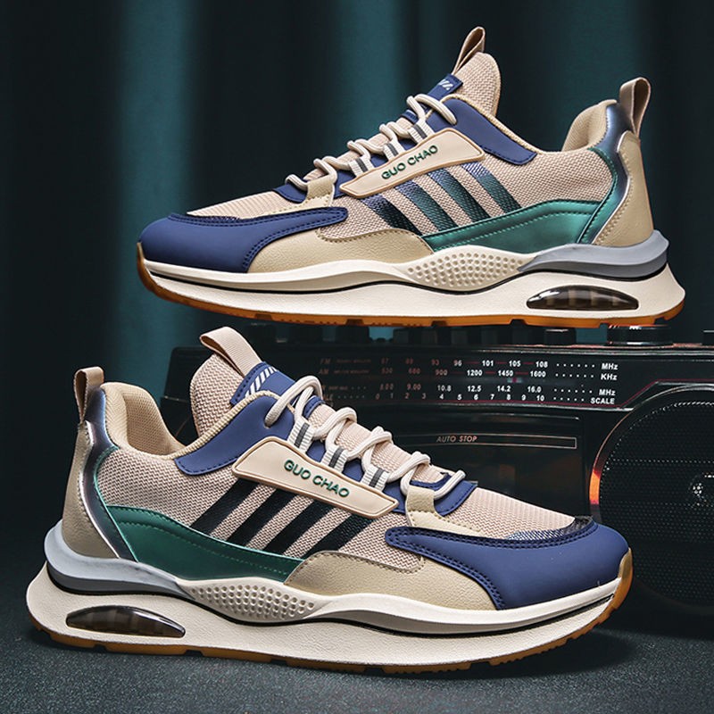 Breathable mesh sneakers in beige with blue accents and green stripe detail