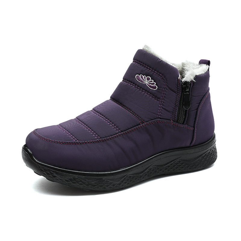 Women’s purple ankle snow boots with faux-fur cuff and front zipper closure